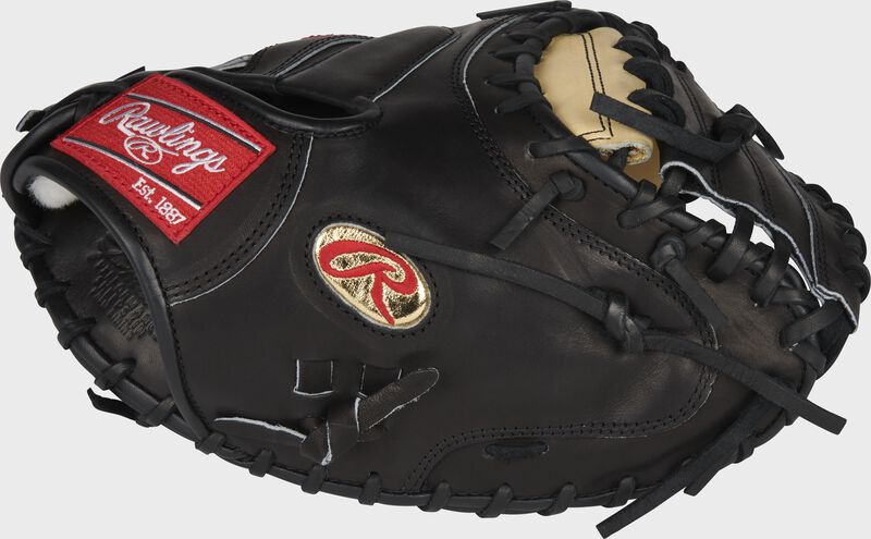Thumb of a black Gameday 57 Series J.T. Realmuto Pro Preferred catcher's mitt with a gold Oval-R - SKU: PROSCM43JR10 loading=