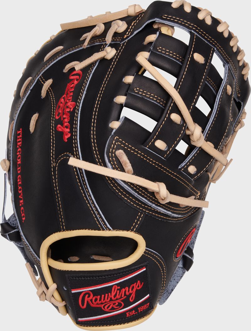 Back of a black Heart of the Hide 12.5" First base mitt with a black Rawlings patch