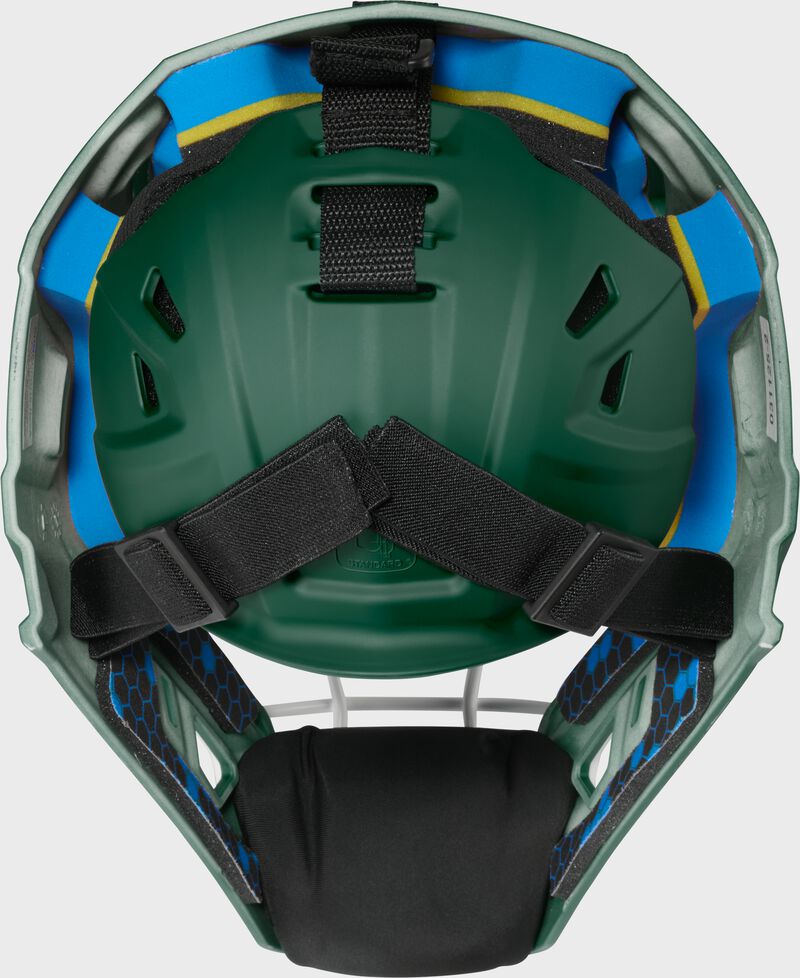Back of a dark green Rawlings Mach Pro Series catcher's helmet loading=