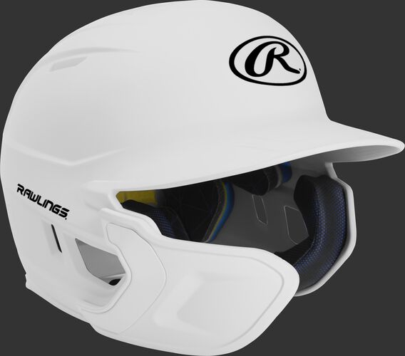 Right angle view of a matte white MACHEXTL Mach Junior helmet with Mach EXT left hand batter face guard extension