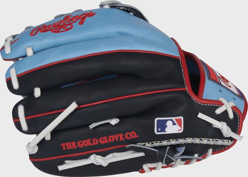 Navy/Columbia blue back of a HOH R2G ColorSync 6.0 12.25-Inch glove with hand-sewn welting and MLB logo on the pinky - SKU: PRORKB17CB image number null