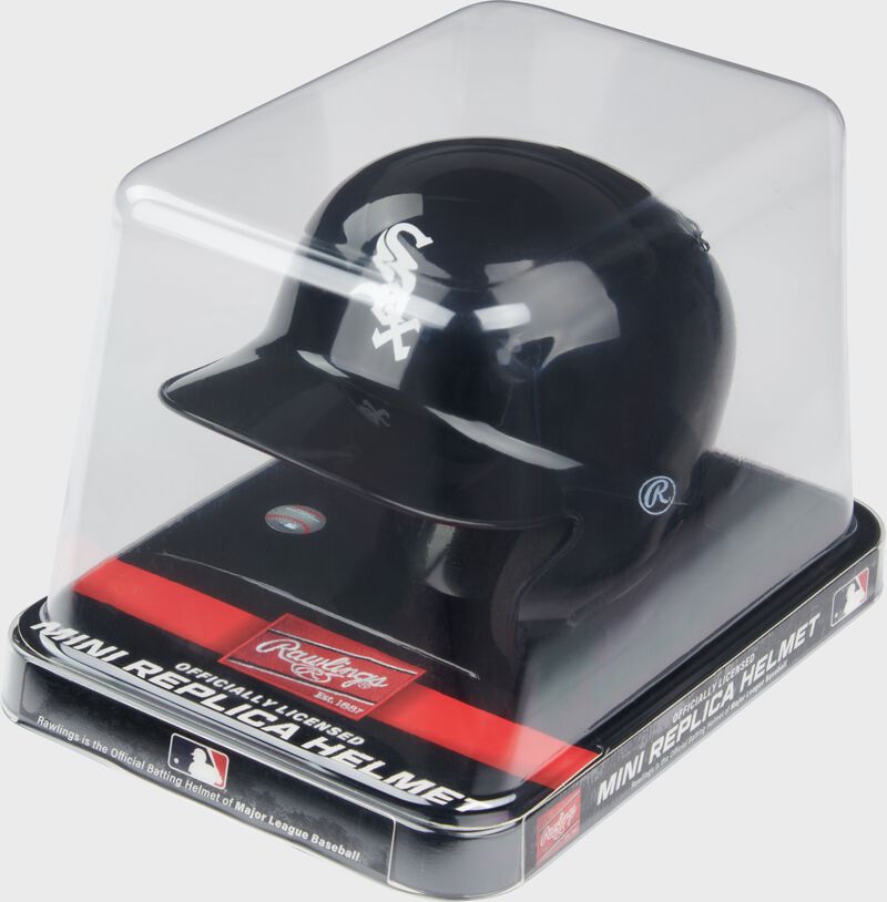A black White Sox mini helmet in a clear packaging case