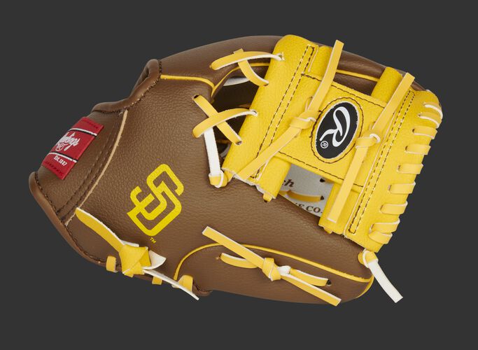 Thumb of a brown/white San Diego Padres 10-Inch team logo glove with a tan I-web and SD logo on the thumb - SKU: 22000019111