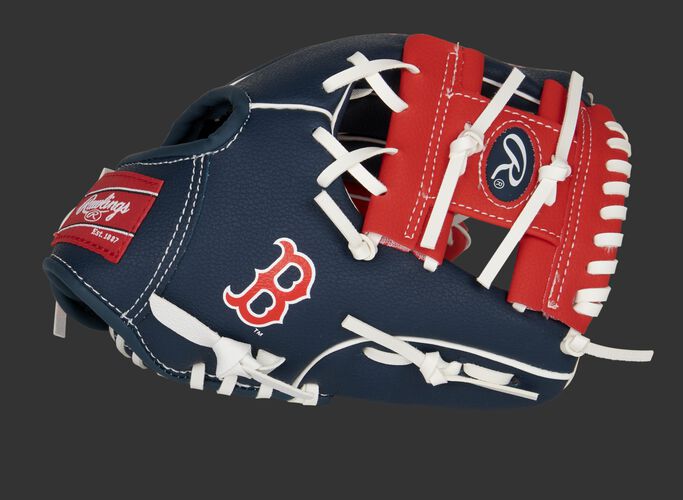 Thumb of a navy/red Boston Red Sox 10-inch team logo glove with a red I-web and Boston logo on the thumb - SKU: 22000024111