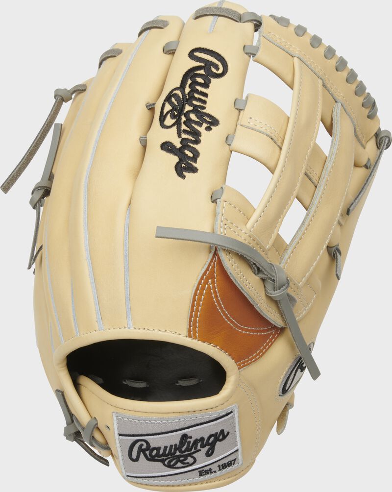 A Heart of the Hide H-web outfield glove with a camel back and silver Rawlings patch - SKU: PRO3039-6TC