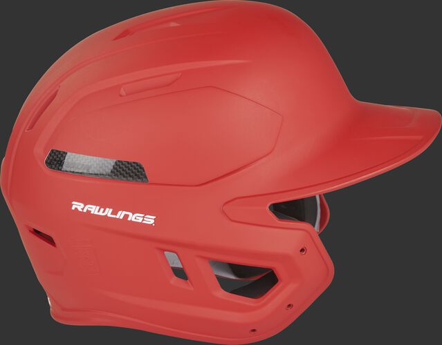 Right side of a CAR07A adult Rawlings batting helmet with a scarlet shell and carbon fiber plate insert