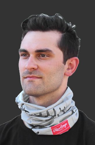 A guy wearing a Rawlings gray stitch gaiter around his neck - RC40001-020