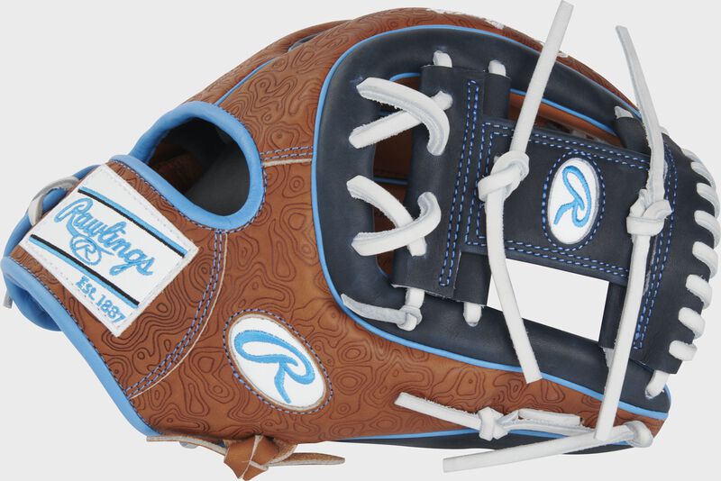 Thumb of a golden brown/navy ColorSync 8.0 Heart of the Hide 11.75" geo-print infield glove with a navy I-web - SKU: PRO314-2GBN
