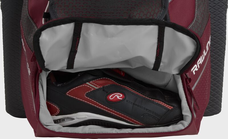 A cardinal Rawlings baseball backpack with a cleat in the bottom cleat storage compartment - SKU: IMPLSE-C