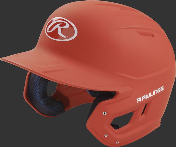 Left angle view of a Rawlings MACH helmet with a one-tone matte burnt orange shell