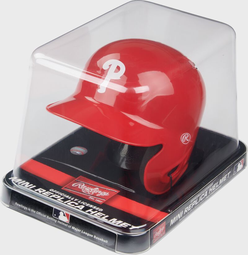 A red Phillies mini helmet in a clear packaging case