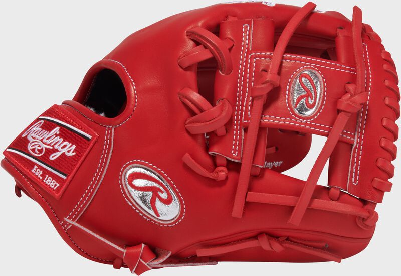 Thumb of a scarlet Gameday 57 Series Andrés Giménez Pro Preferred Glove with a platinum Oval-R and scarlet I-web