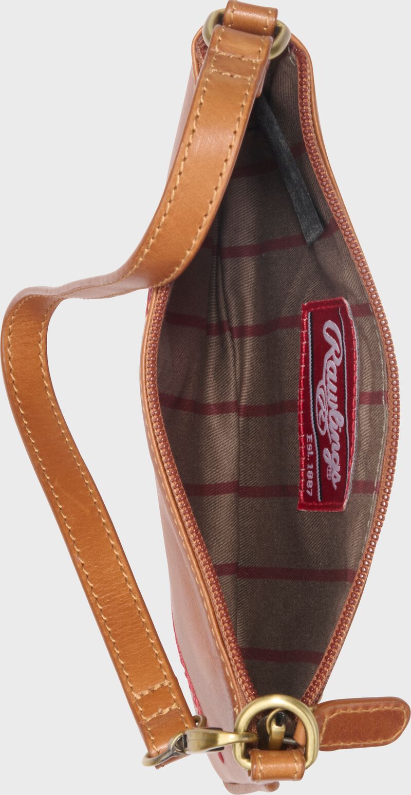 Inside view of a tan Rawlings Double Play wristlet