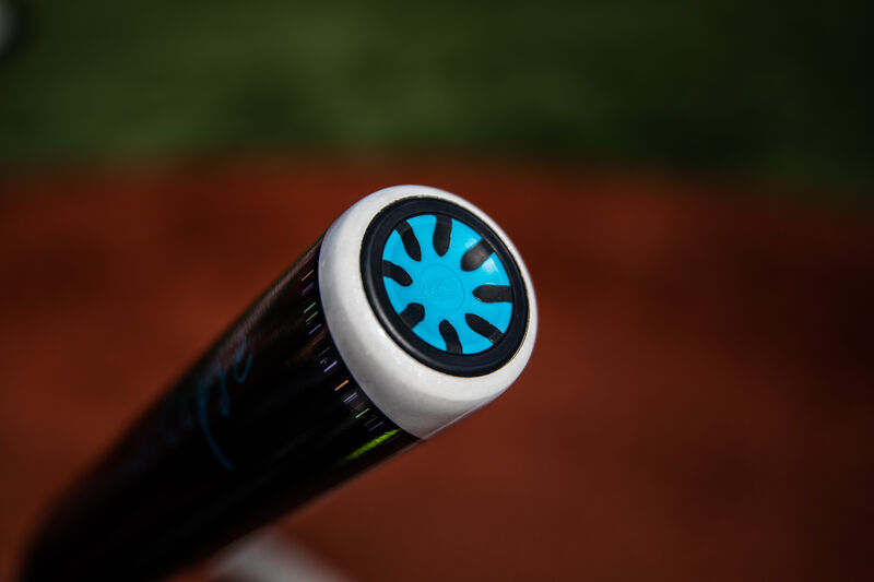 End cap of a Rawlings Eclipse fastpitch bat with a field in the background - SKU: FPZE12