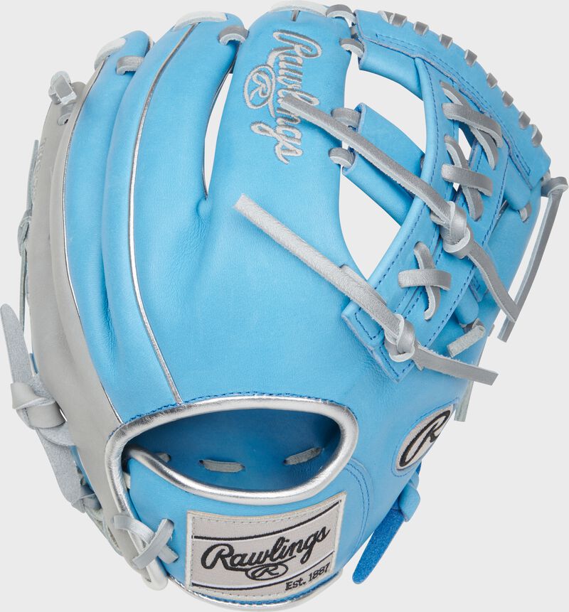 Columbia blue back of a Heart of the Hide 11.5" split laced single post web glove with a gray Rawlings patch