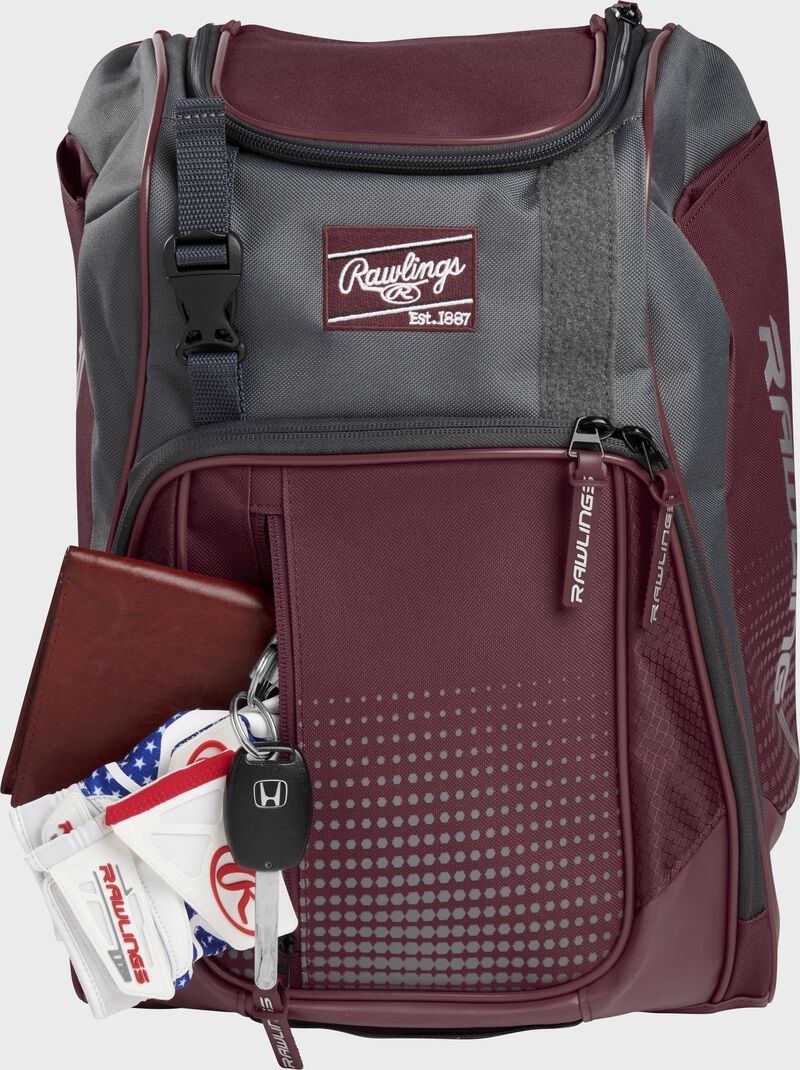 Wallet, keys, and batting gloves in the front valuables pocket of a maroon Franchise baseball bag - SKU: FRANBP-MA