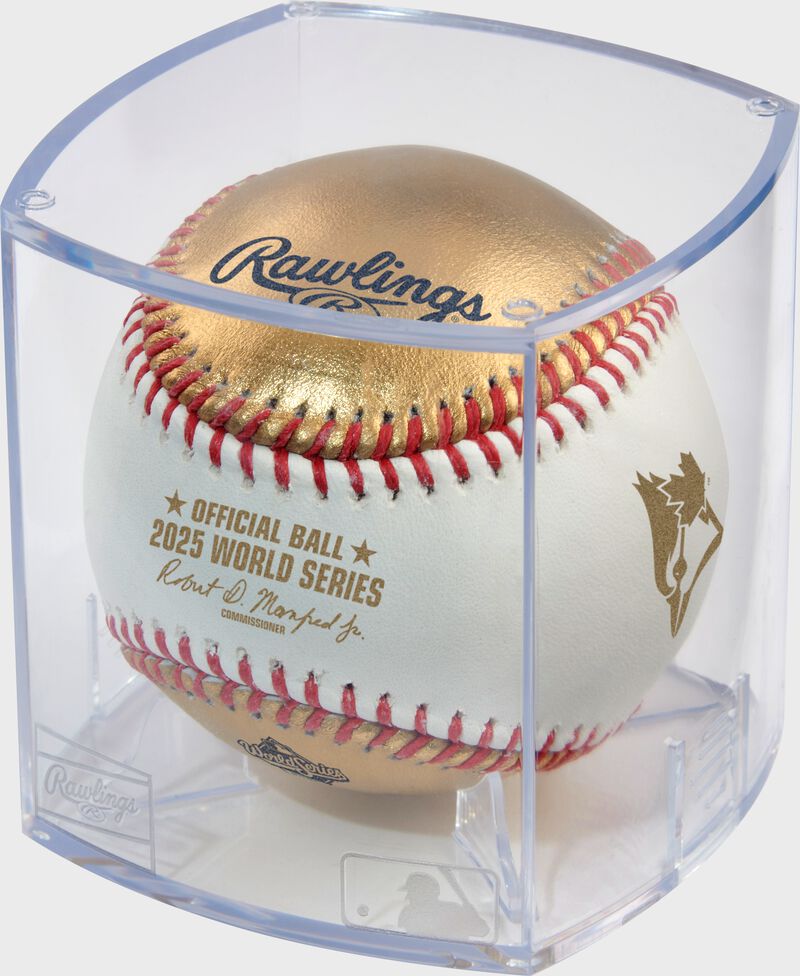 A MLB 2025 Gold World Series dueling baseball in a clear display cube loading=