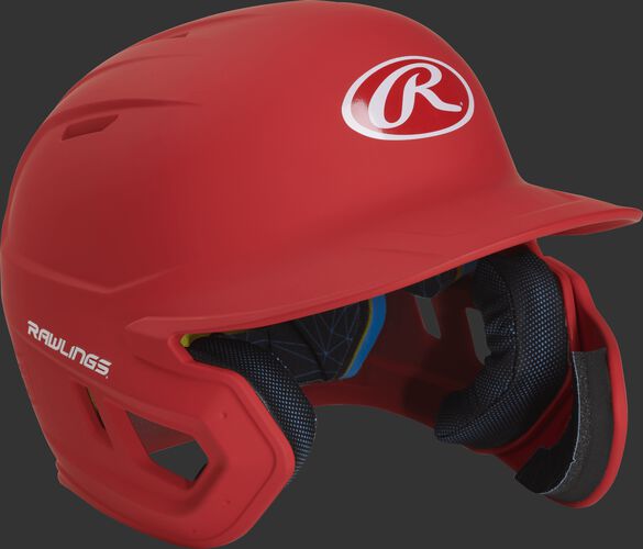 Right angle view of a MACHEXTR Rawlings Mach EXT helmet with a one-tone matte scarlet shell