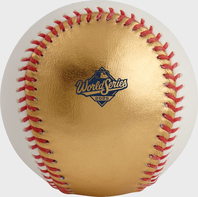 The 2025 World Series logo stamped on the gold side of a 2025 MLB Gold World Series dueling baseball loading=