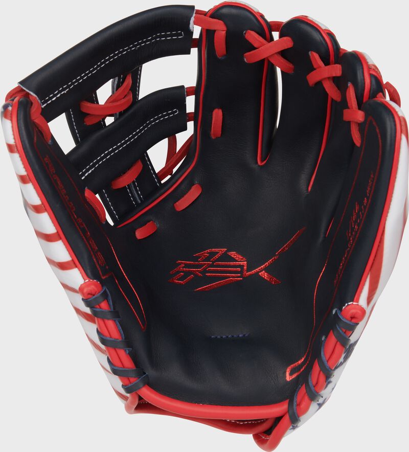 Navy palm of a Rawlings 4th of July REV1X 11.5" infield glove with scarlet laces and scarlet palm stamping
